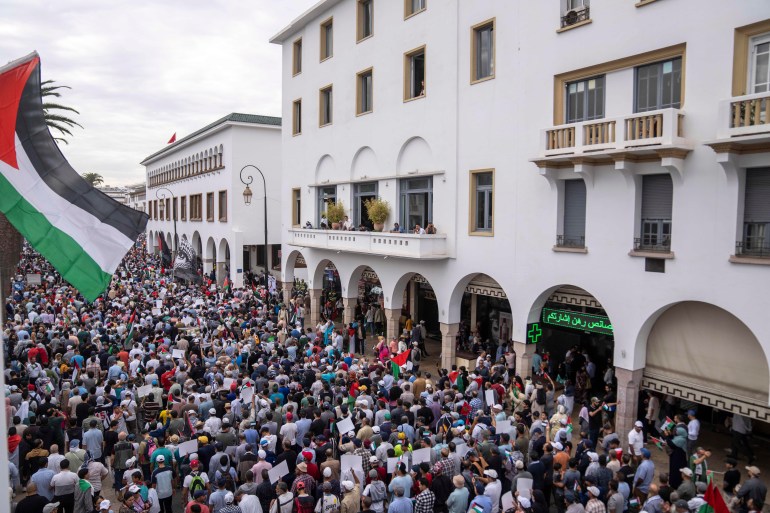 Thousands of Moroccans take part in a protest in solidarity with Palestinians in Gaza, in Rabat, Morocco, Sunday, Oct. 15, 2023. (AP Photo/Mosa'ab Elshamy)