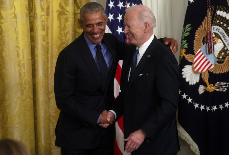 U.S. President Joe Biden and former U.S. President Barack Obama embrace after they spoke about the Affordable Care Act and Medicaid at the White House in Washington, U.S., April 5, 2022. REUTERS/Leah Millis