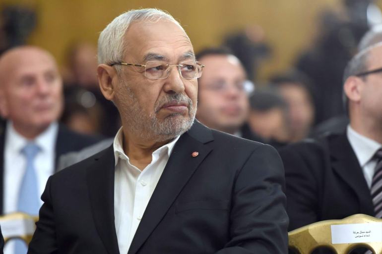 Tunisia's Ennahdha Islamist Party Leader Rached Ghannouchi looks on during a handover ceremony attended by the country's newly elected government in Tunis on February 6, 2015. A secular-led coalition government that includes Islamists took office in Tunisia, three months after the North African state's first free parliamentary elections. AFP PHOTO / FETHI BELAID (Photo by Fethi Belaid / AFP)