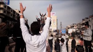فيديو. سكان بابا عمرو في حمص يحتفلون بنهاية نظام الأسد