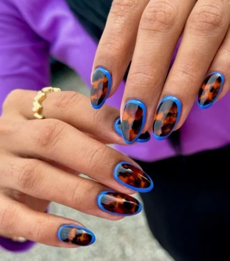 أظافر بلمسة جريئة.. عندما تلتقي طبعات النمر بالألوان الزاهية – أخبار السعودية